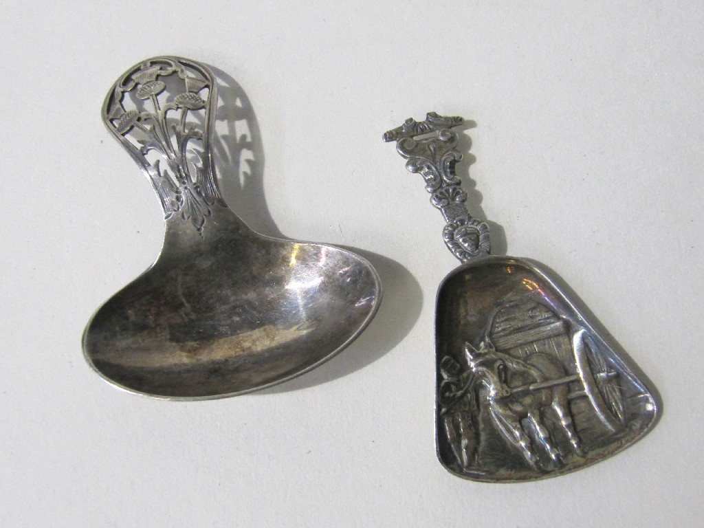 Appraisal: Lot comprising continental silver caddy spoon and an unmarked caddy