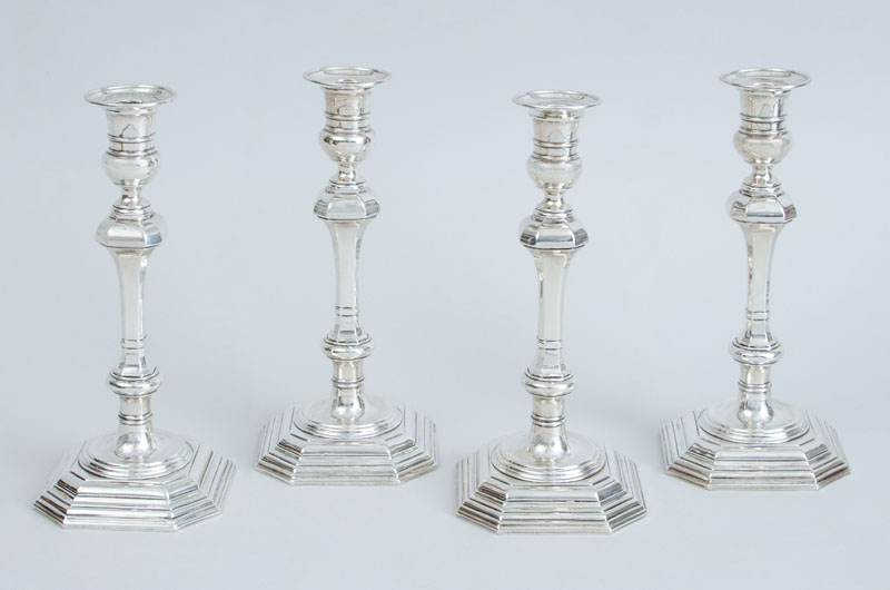 Appraisal: SET OF FOUR CRICHTON BROS CRESTED AND WEIGHTED SILVER CANDLESTICKS