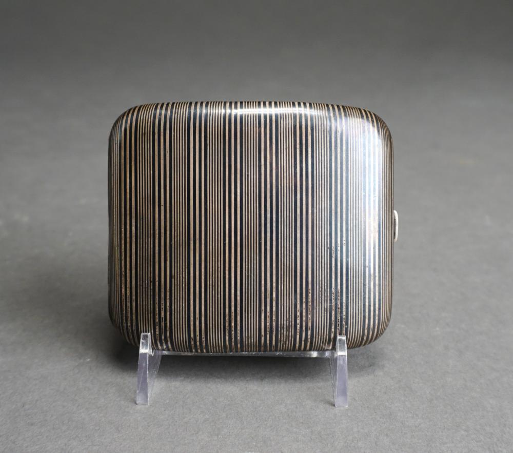 Appraisal: GERMAN -SILVER AND STRIATED BLACK ENAMEL CIGARETTE CASE X IN