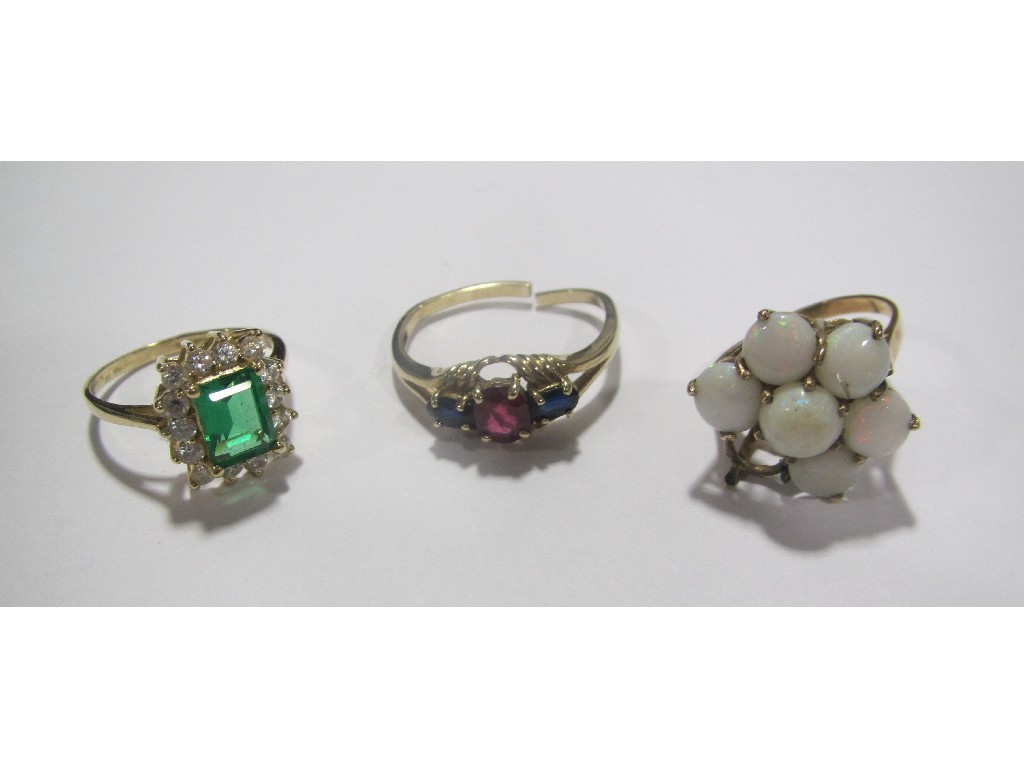 Appraisal: Lot comprising three ct gold gem set dress rings