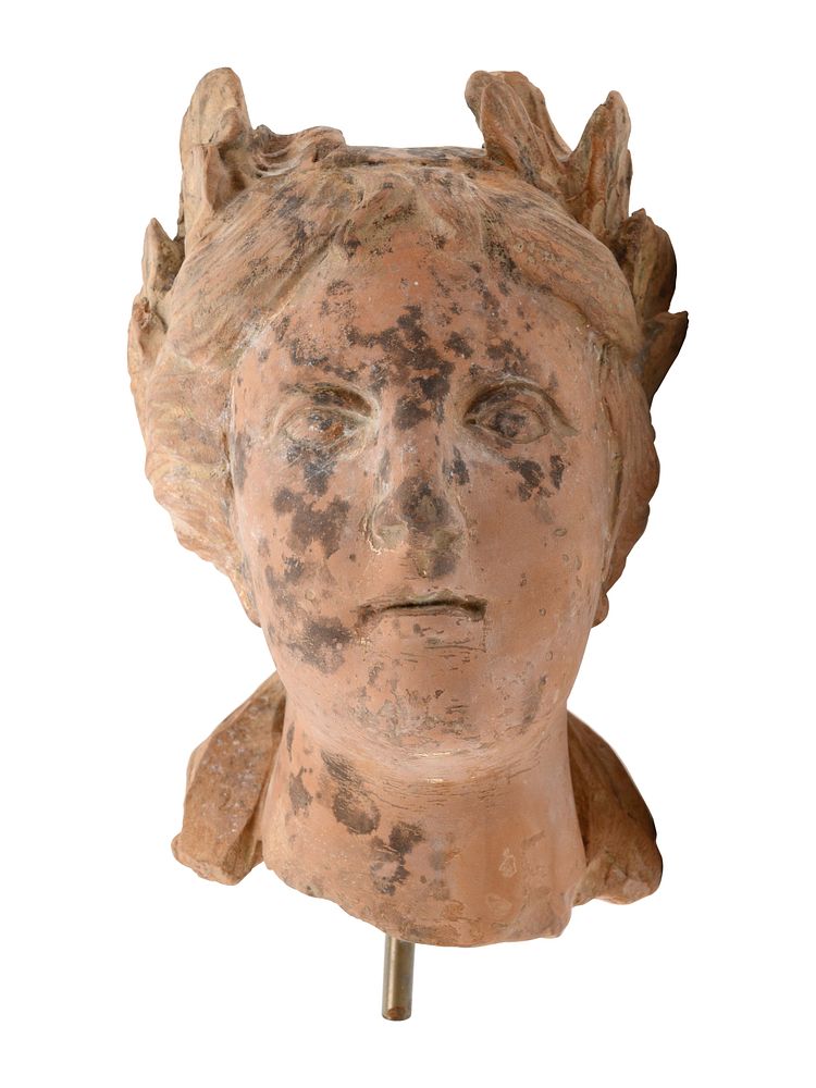 Appraisal: A Roman Style Terracotta Head of a Woman A Roman