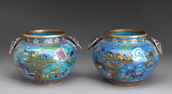 Appraisal: A pair of cloisonn enameled metal jars th Century Each