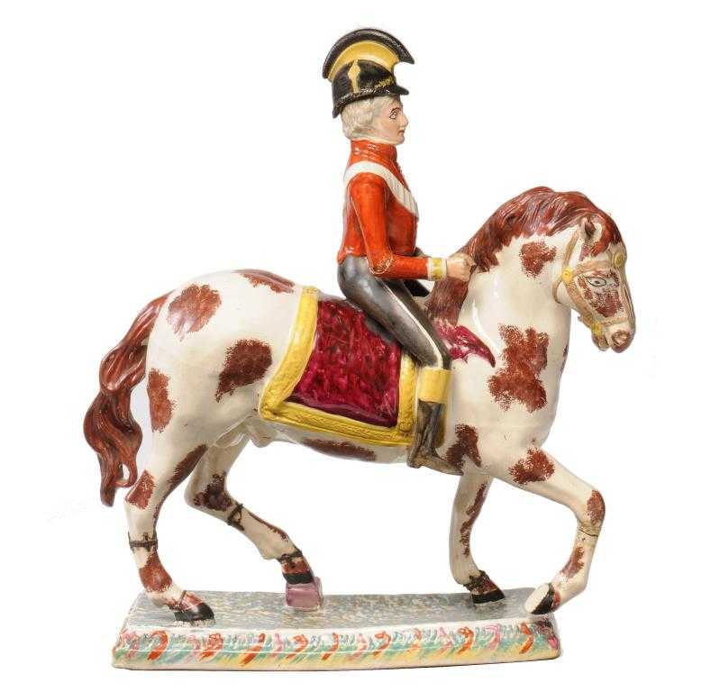 Appraisal: A RARE EQUESTRIAN FIGURE OF AN OFFICER PROBABLY STAFFORDSHIRE of