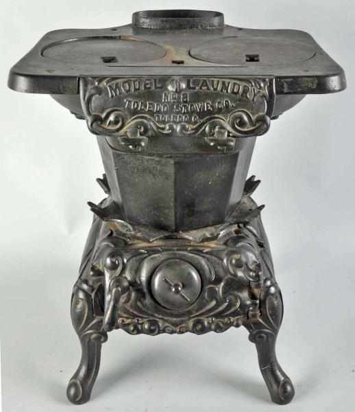 Appraisal: Large Cast Iron Model Laundry Stove Description With two burners