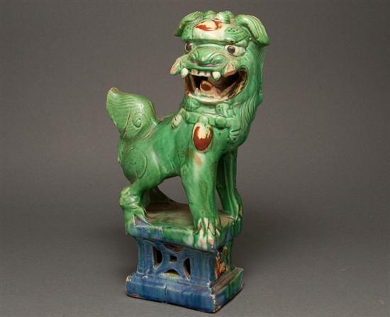 Appraisal: Chinese glazed terracotta Foo Lion in H with pinkish body