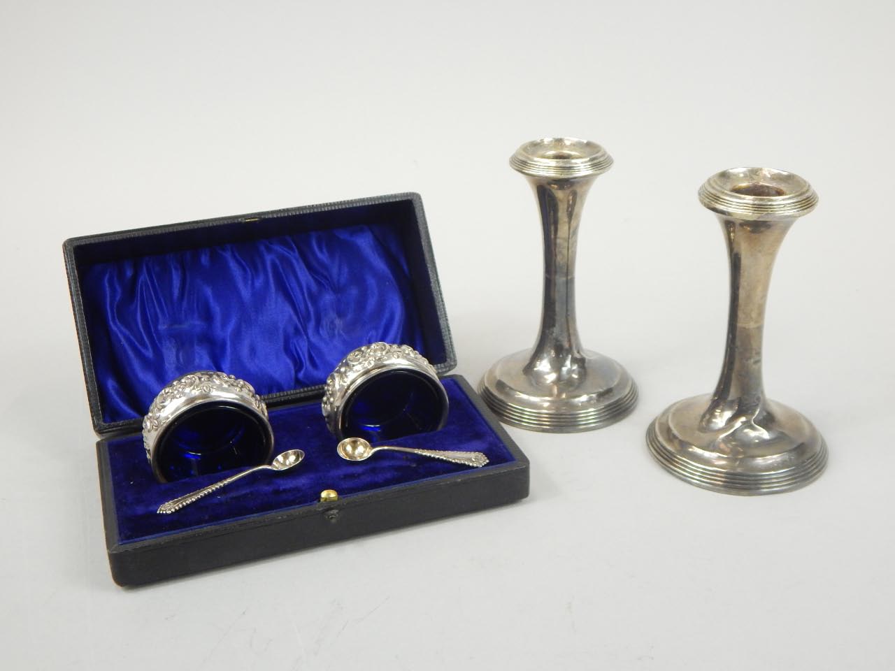 Appraisal: A cased Edwardian silver condiment set comprising of two open