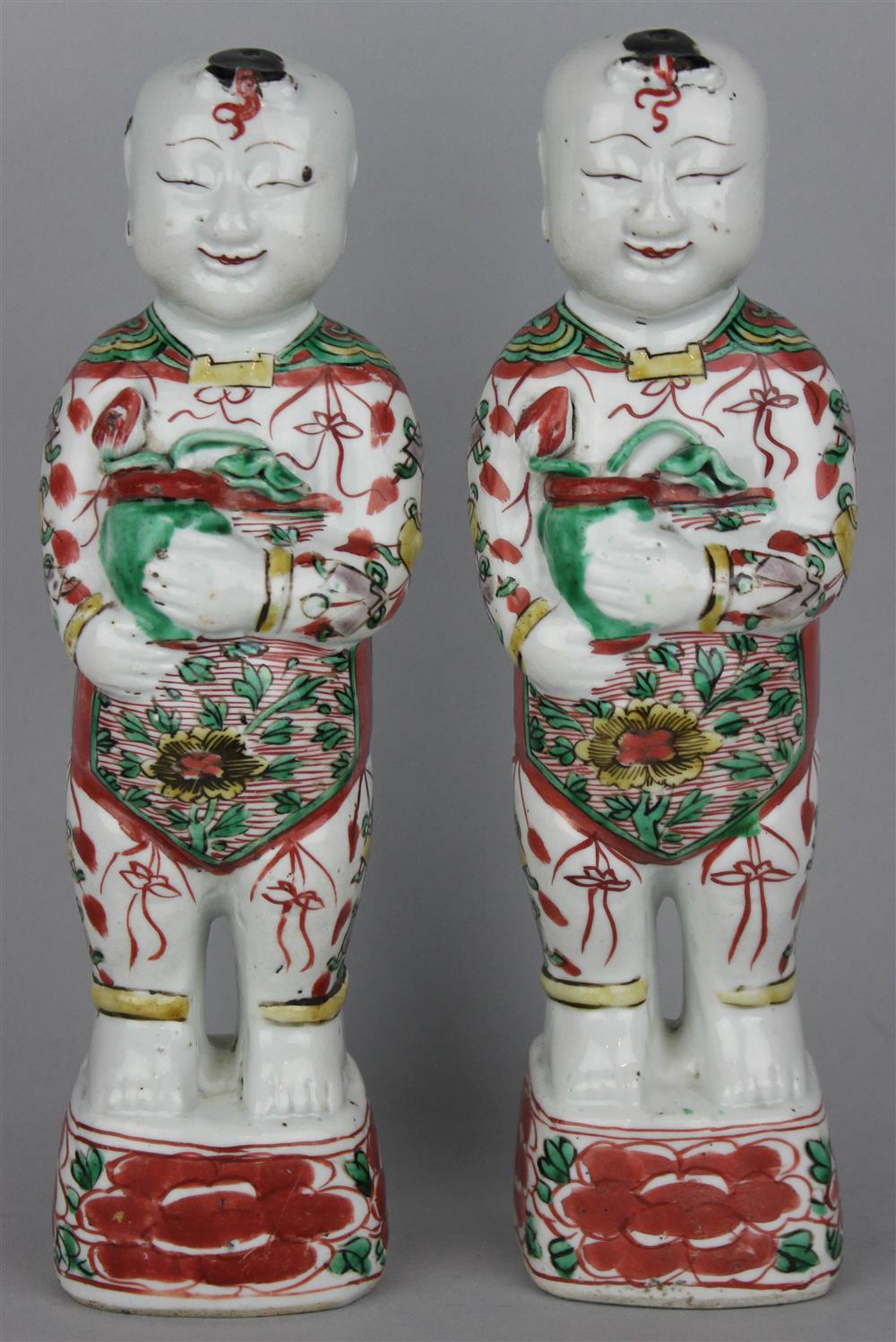 Appraisal: PAIR OF CHINESE FAMILLE VERTE FIGURES OF HE HE ERXIAN