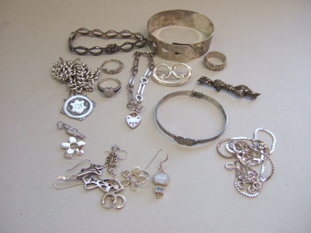 Appraisal: Mostly silver jewellery comprising a curb link watch Albert chain