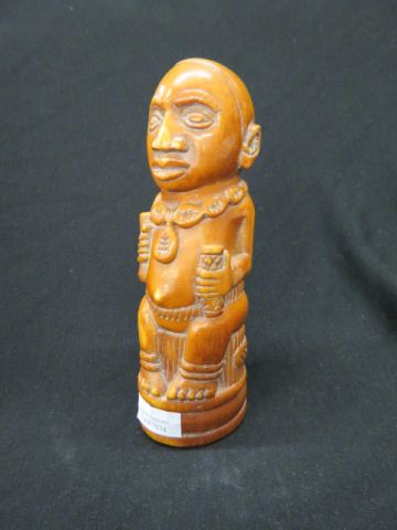 Appraisal: Carved Ivory Tribal Figurine seated man tall