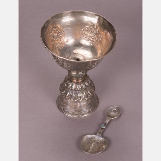 Appraisal: A Sino-Tibetan Silver Alter Cup with Repousses Decoration th Century