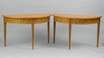 Appraisal: A Pair of Demilune Tables A pair of demilune tables