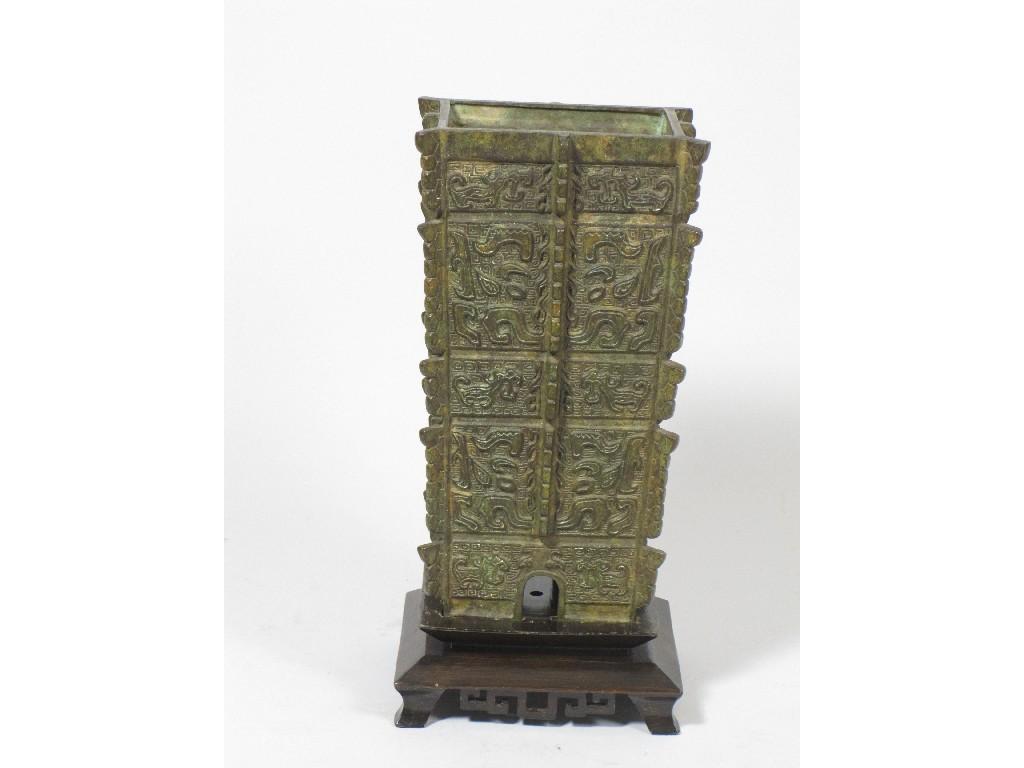 Appraisal: A large square section Chinese bronze Vase with stand in