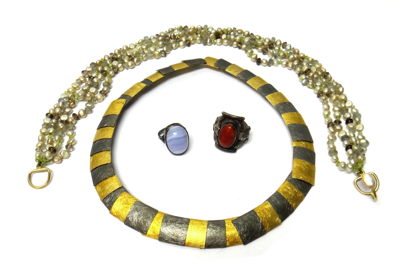 Appraisal: A silver and gilt collar necklace in a square panel