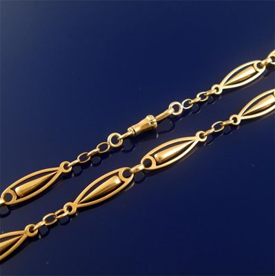 Appraisal: A gold fancy link necklace with swivel clasp choker length