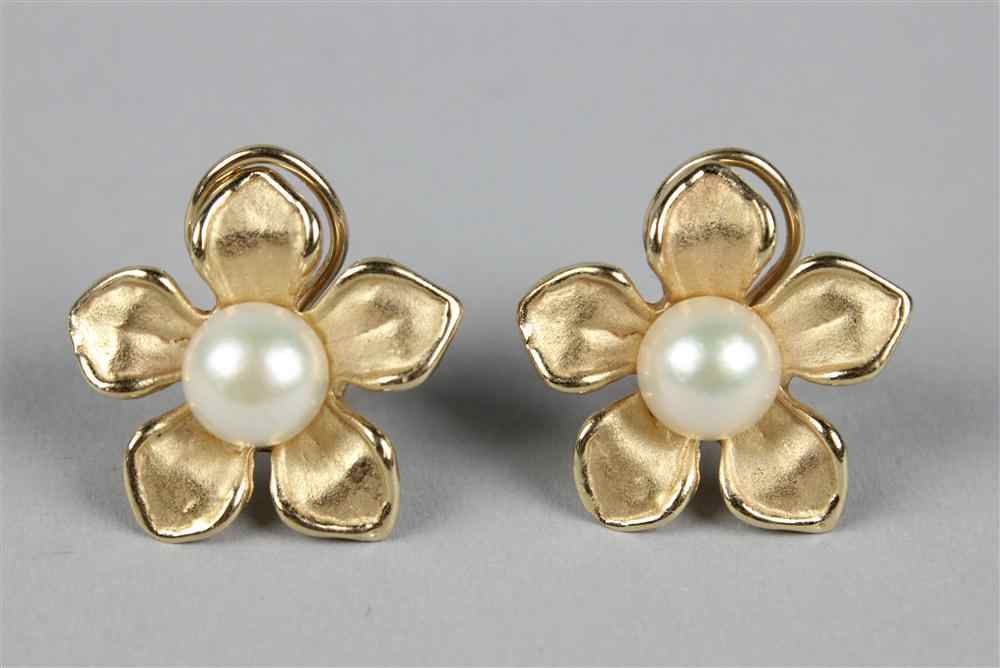 Appraisal: LADY'S YELLOW GOLD AND PEARL FLOWER-FORM EAR CLIPS each fashioned