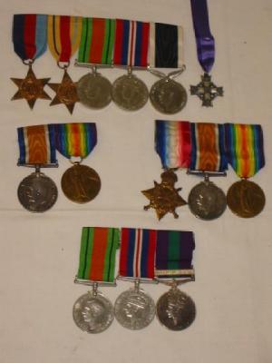 Appraisal: A FAMILY OF MEDALS for four members of the Booth