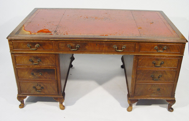 Appraisal: Reproduction mahogany twin pedestal desk with red tooled leather insert