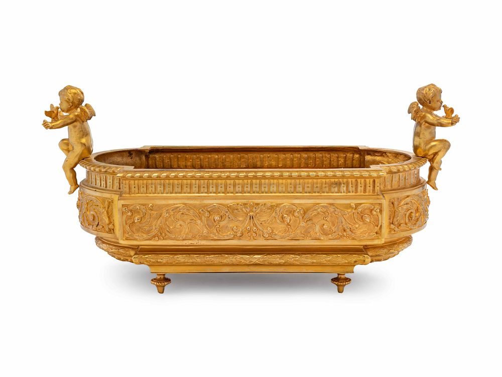 Appraisal: A Neoclassical Gilt Bronze Figural Jardiniere A Neoclassical Gilt Bronze