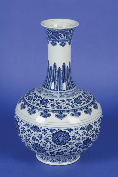 Appraisal: A CHINESE BLUE AND WHITE BOTTLE VASE in the Ming