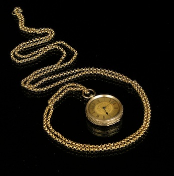 Appraisal: An k Gold Pocket Watch Marked Matile With Chain French