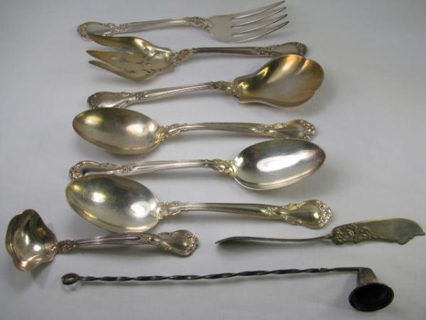 Appraisal: Assorted sterling silver serving pieces Candle snuffer long Five spoons