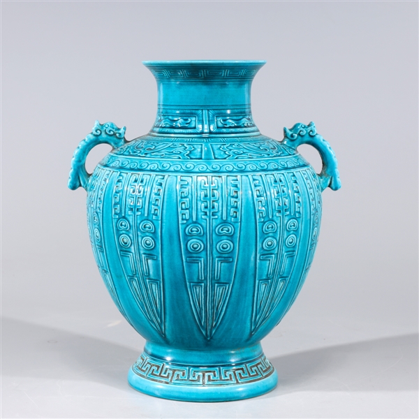 Appraisal: Chinese blue glazed porcelain vase with molded designs to body