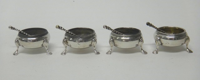 Appraisal: A set of four Victorian silver cauldron shaped salts each