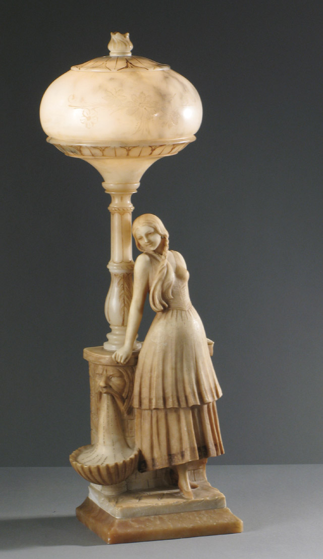 Appraisal: AN ALABASTER SCULPTED FIGURAL TABLE LAMP Young woman with long