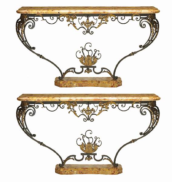 Appraisal: A good pair of Louis XV style parcel gilt iron