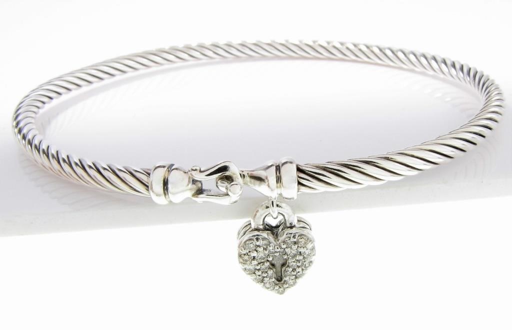 Appraisal: A David Yurman sterling silver bangle bracelet with hook top