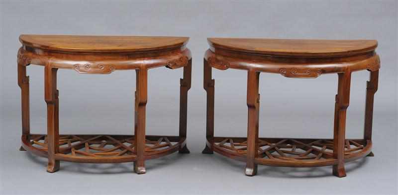 Appraisal: PAIR OF CHINESE ELM D-SHAPED CONSOLES Each with a d-shape