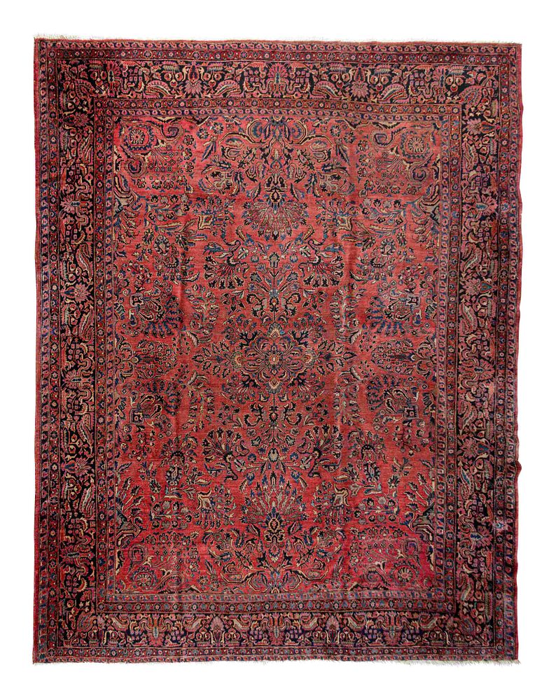 Appraisal: A Sarouk Wool Rug A Sarouk Wool Rug Early th