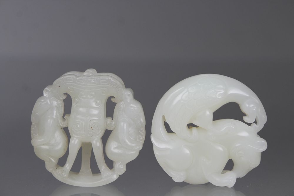 Appraisal: Carved Chinese Jade Circular Pendants Carved Chinese Jade Circular Pendants