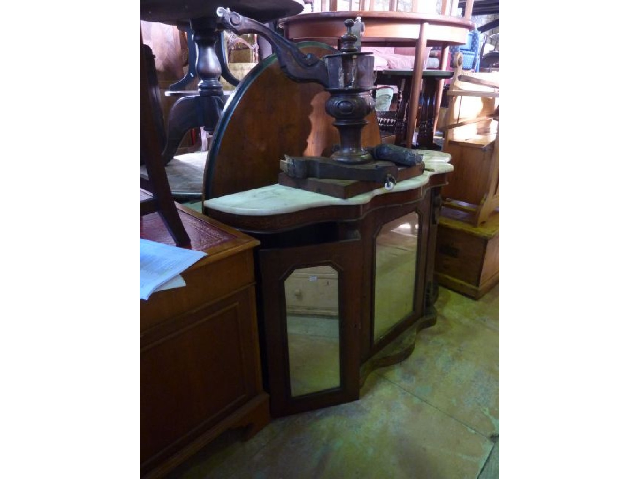 Appraisal: A Victorian walnut and inlaid side cupboard base enclosed by