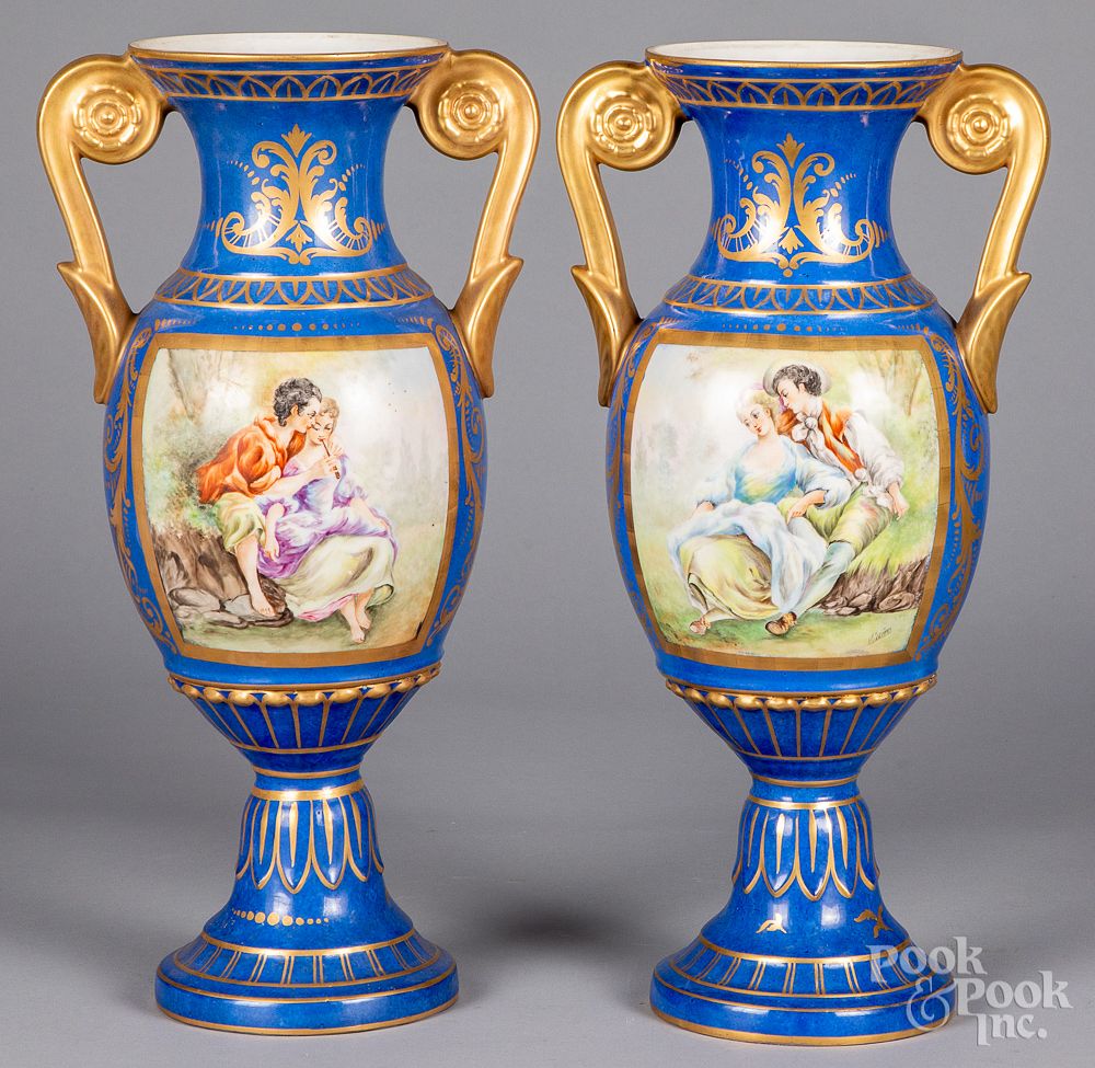 Appraisal: Pair of Sevres style porcelain urns Pair of Sevres style