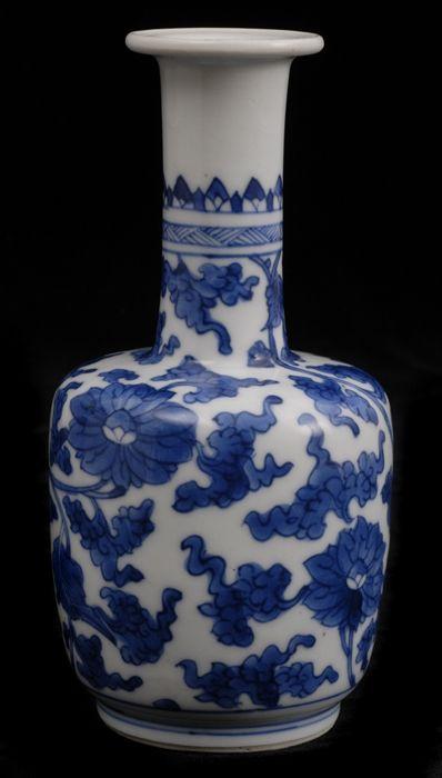 Appraisal: CHINESE BLUE AND WHITE PORCELAIN VASE The tapered cylindrical footed