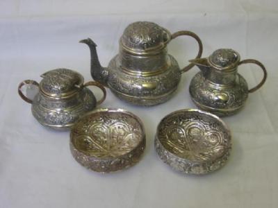 Appraisal: AN INDIAN THREE PIECE TEA SET of circular form with