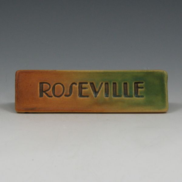 Appraisal: Angled Roseville Rainbow or Futura dealer sign in green and