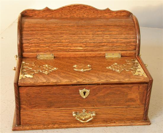 Appraisal: Victorian oak and brass mounted stationery box the hinged cover