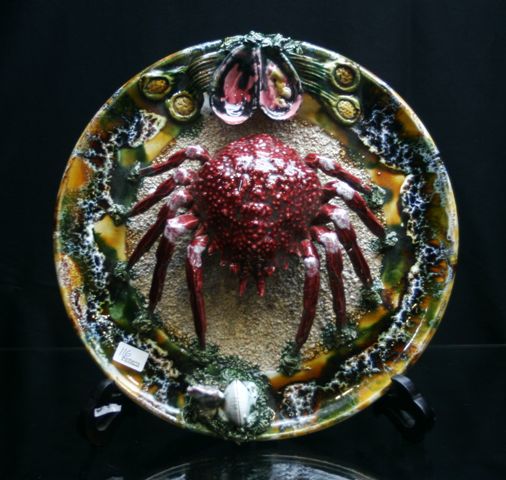 Appraisal: A Portuguese Majolica Pallissy wall charger decorated with a crab