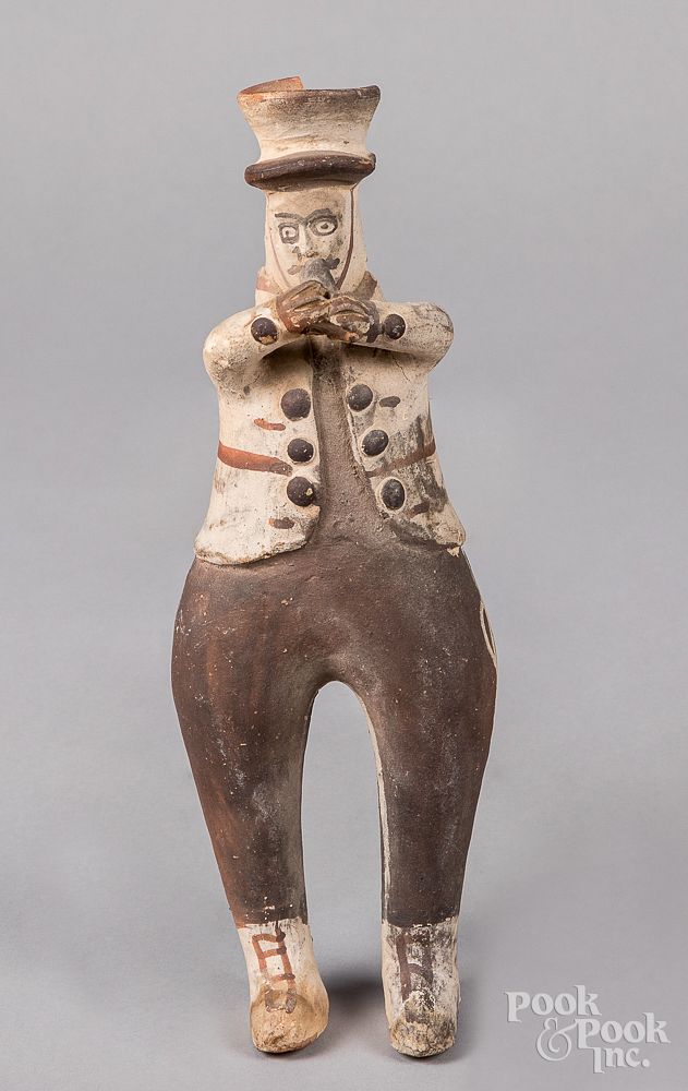 Appraisal: Cochiti Indian pottery polychromed figure Cochiti Indian pottery polychromed figure