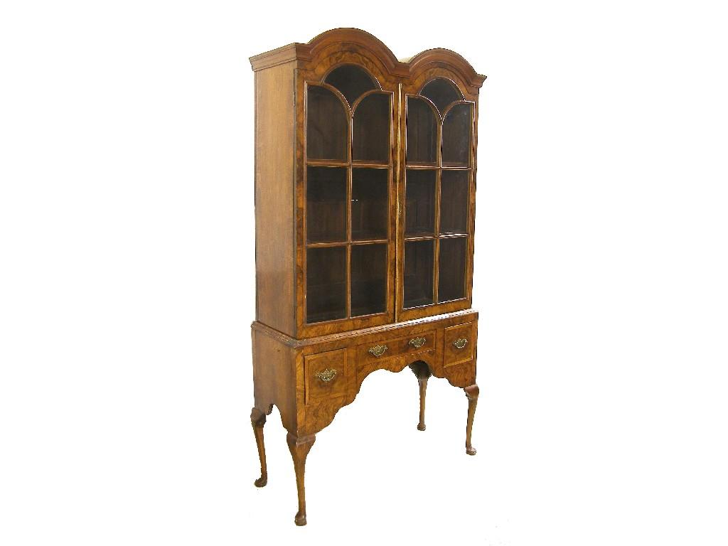 Appraisal: Georgian style figured walnut double dome display cabinet the moulded