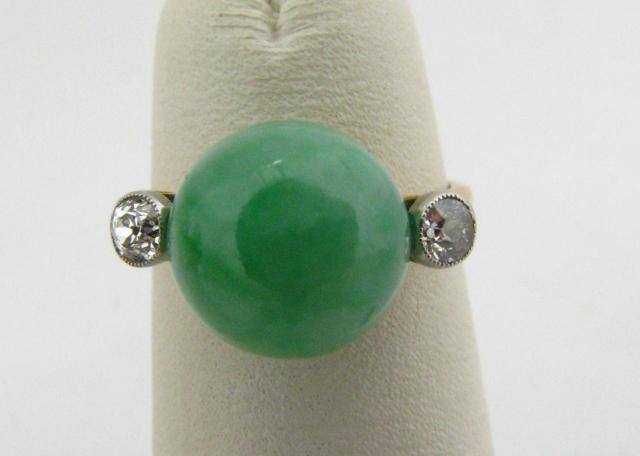 Appraisal: K yellow gold mm bead jade ring with two round