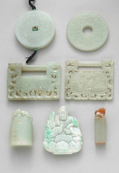 Appraisal: Seven jade ornaments Including two celadon nephrite disks one of