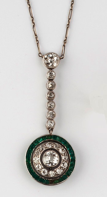 Appraisal: A DIAMOND AND GEM SET PENDANT NECKLACE the circular target-shaped