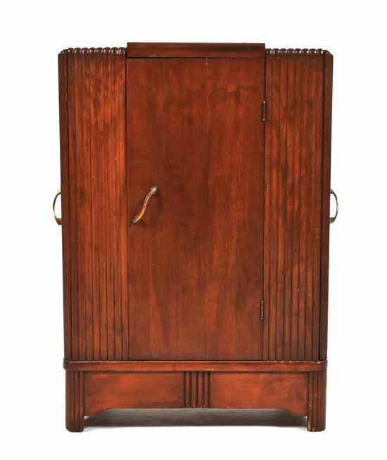 Appraisal: An Art Deco Bar Cabinet having a stepped top over