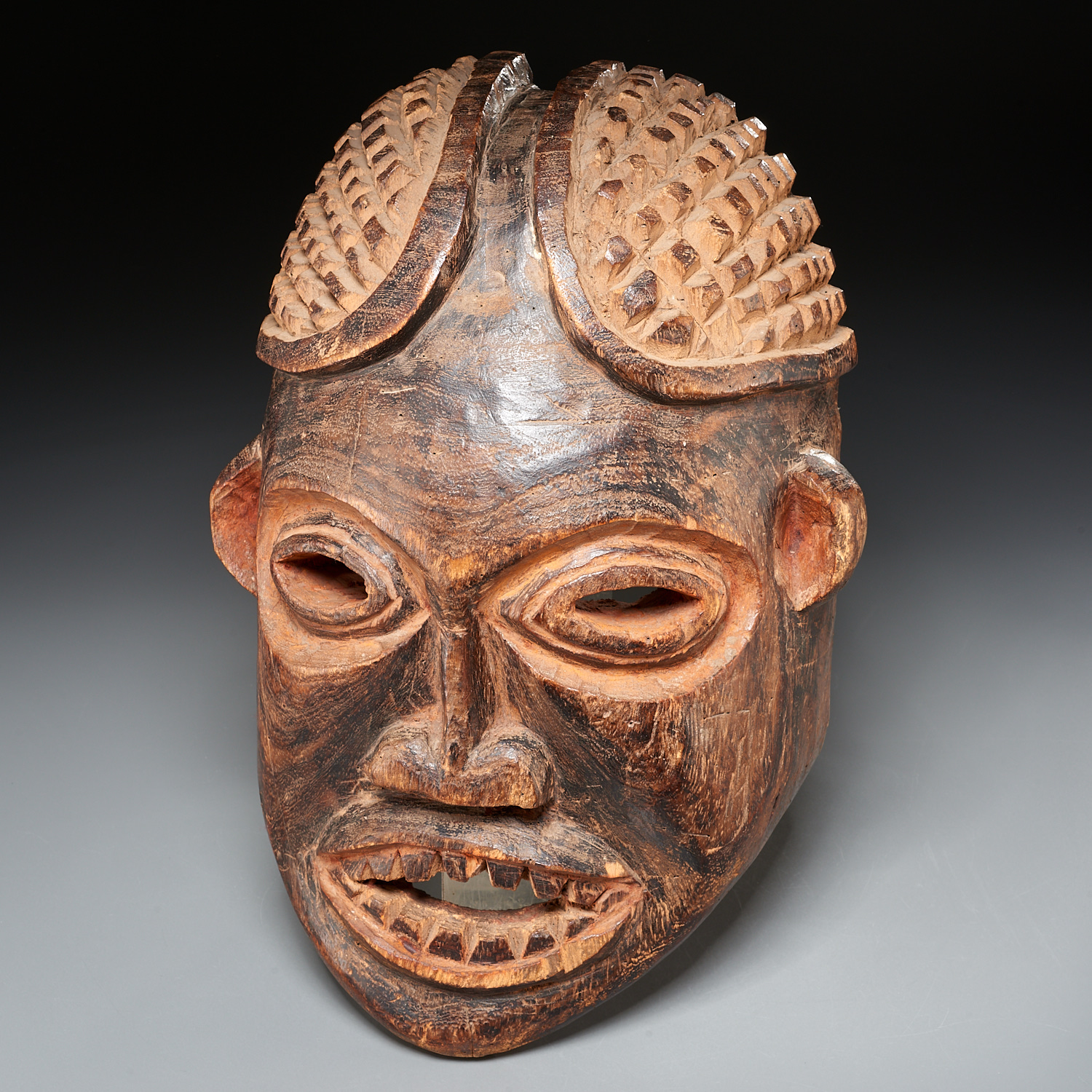 Appraisal: BAMILEKE PEOPLES LARGE HELMET MASK EX-MUSEUM th c Cameroon carved