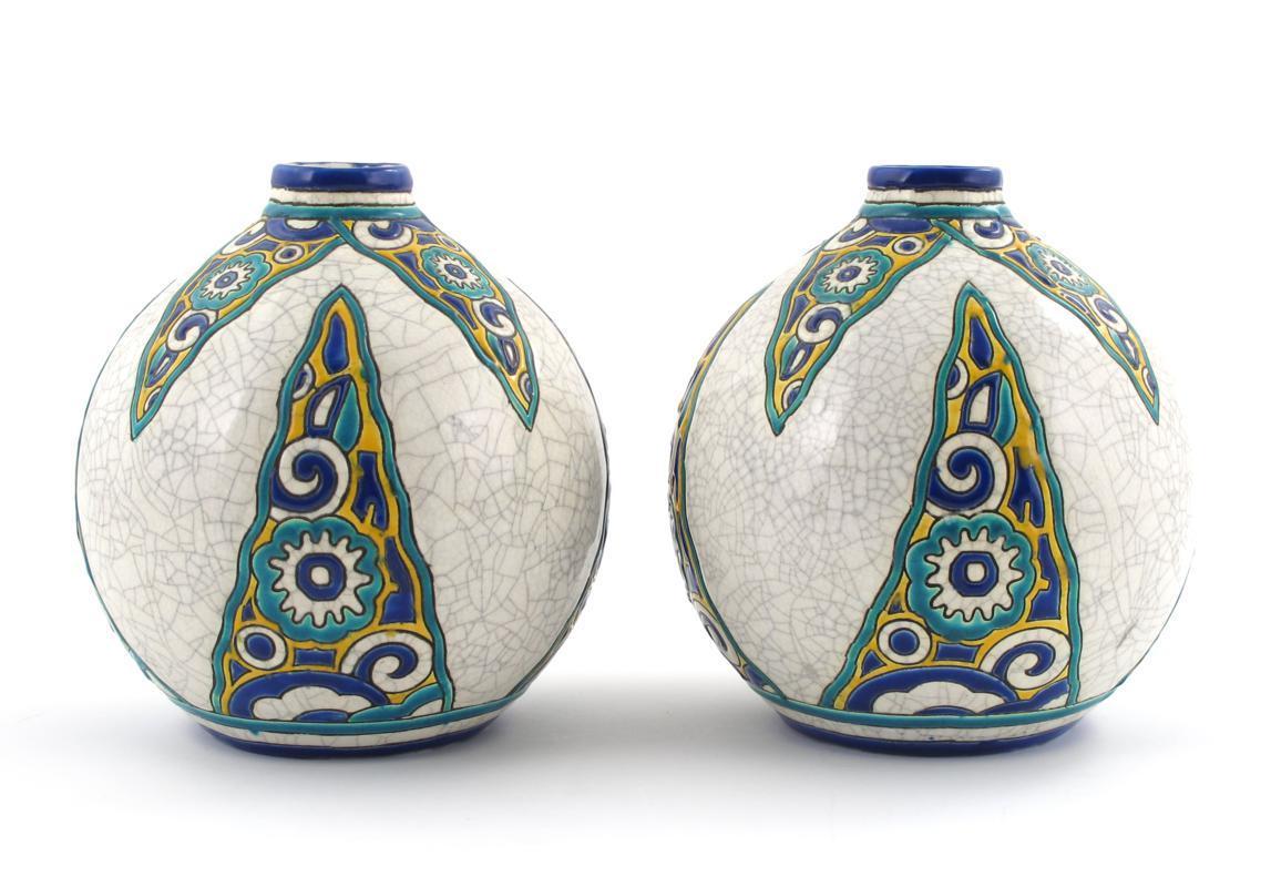 Appraisal: A pair of Boch Freres Pottery Stalactites vases