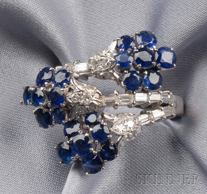 Appraisal: Sapphire and Diamond Ring the floral motif bypass ring with