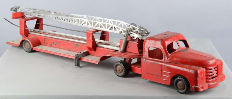 Appraisal: Structo Pressed Steel Hook Ladder Truck This red ladder truck